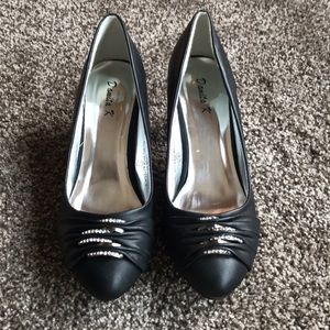 Black leather heel with diamond accent